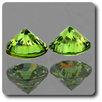0.77 cts LOT DE 2 GRENAT DEMANTOIDE . IF