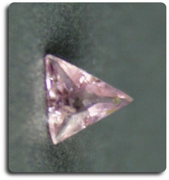 0.04 cts PEZZOTAITE . VS