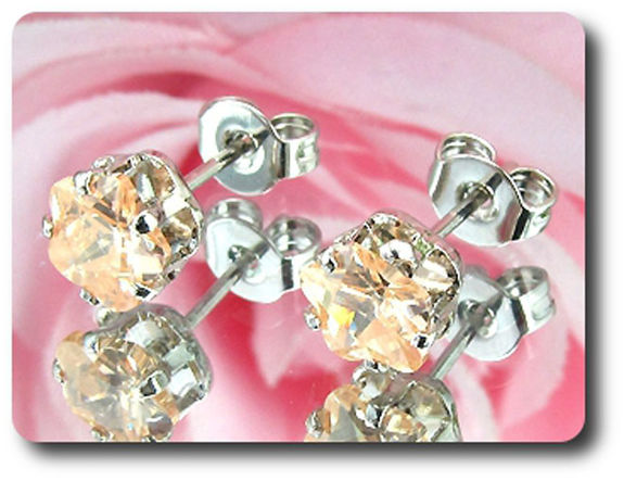 2x6mm Orange Sapphire Earrings