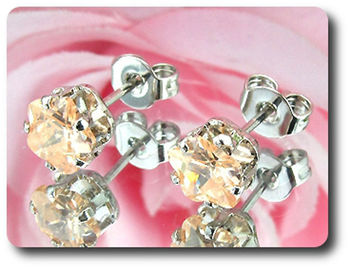 2x6mm Orange Sapphire Earrings