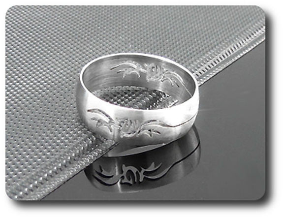 BAGUE HOMME MOTIF AILES