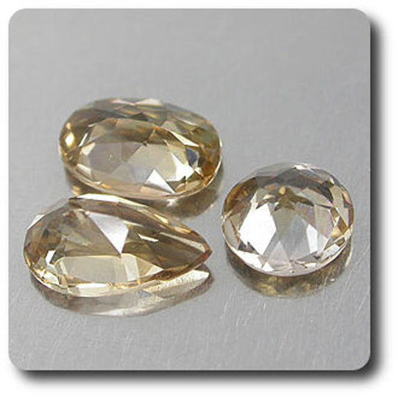 1.05CT. 3 pcs. COLOR CHANGE AXINITE . VS