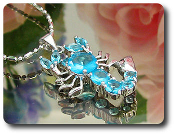 7-3 mm Blue Topaz Scorpion Pendant