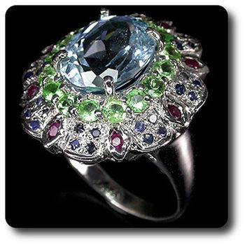 TOPAZ, TSAVORITE GARNET, SAPPHIRE & RUBY RING