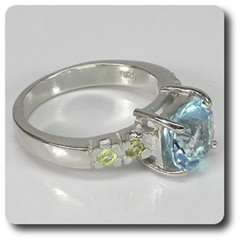 BLUE TOPAZ-YELLOW SAPPHIRE RING