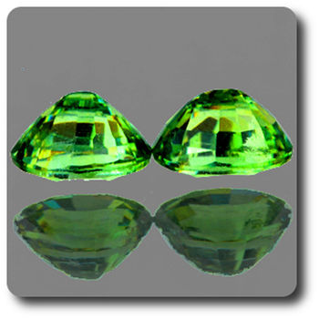 0.77 cts LOT DE 2 GRENAT DEMANTOIDE . IF