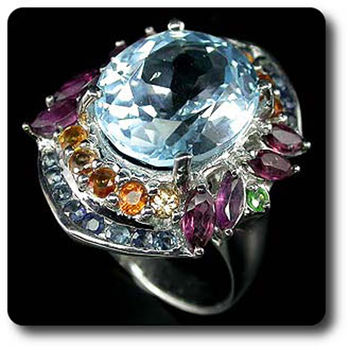 TOPAZ, SAPPHIRE & TSAVORITE GARNET RING