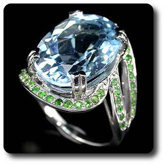 BLUE TOPAZ & TSAVORITE GARNET RING