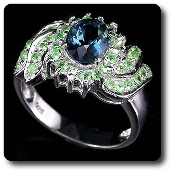 BAGUE TOPAZE BLEU & GRENAT TSAVORITE