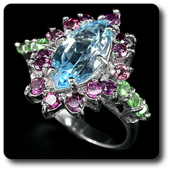 BAGUE TOPAZE BLEU, GRENAT TSAVORITE & GRENAT RHODOLITE ROSE
