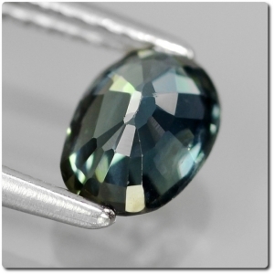 0.89 CT. GREEN BLUE SAPPHIRE. SI1