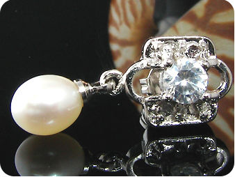 2x8mm White Fresh Water Pearl Oval Cut Earrings