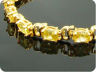 12 x 7mm Yellow Topazes Oval Cut Gold Bracelet