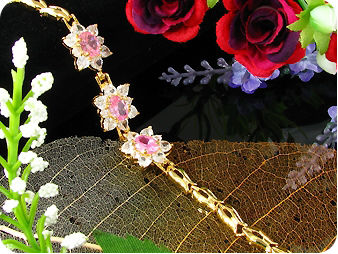 3x9 mm Pink Sapphire White Topaz Gold Bracelet