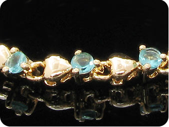 19 x 3mm Blue Sapphires Gold Bracelet