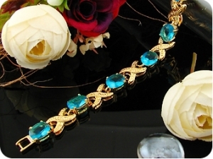 9x9mm Ocean Blue Sapphire Oval Gold Bracelet