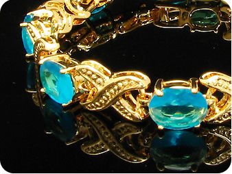 9x9mm Ocean Blue Sapphire Oval Gold Bracelet