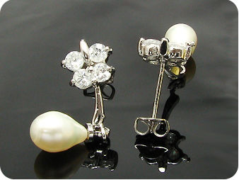 Voguish 2x7mm White Fresh Water Pearl Oval Cut Earrings