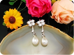 Voguish 2x7mm White Fresh Water Pearl Oval Cut Earrings