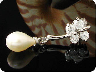 Voguish 2x7mm White Fresh Water Pearl Oval Cut Earrings