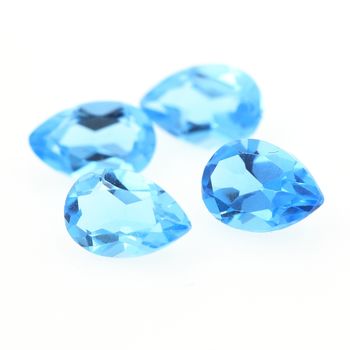 0.49 cts TOPAZE BLEU SWISS . 6x4 MM. IF - VVS1 ( vendu à l'unité )