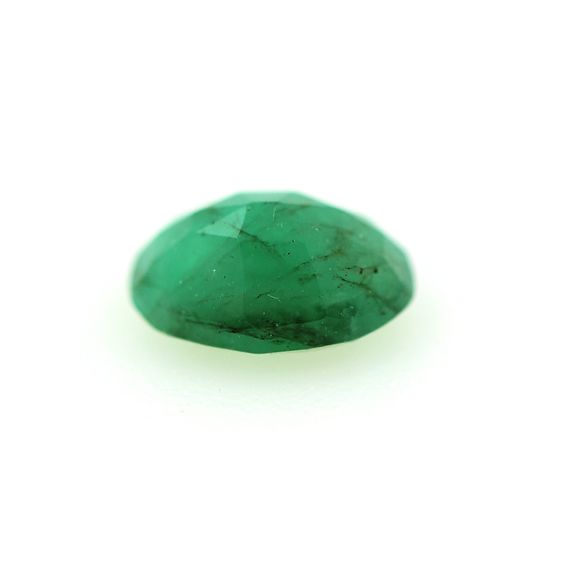 0.60CT.  GREEN EMERALD