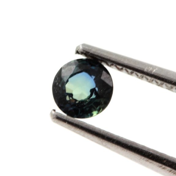 0.32 cts. BLUE GREEN SAPPHIRE. UNHEATED