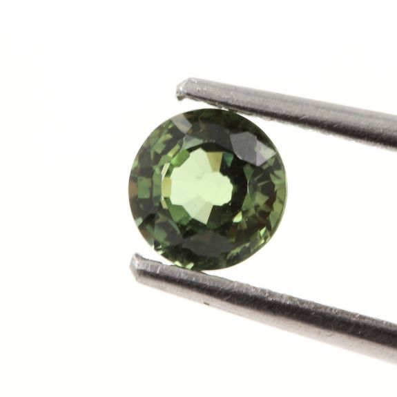 0.58 cts. GREEN SAPPHIRE. UNHEATED