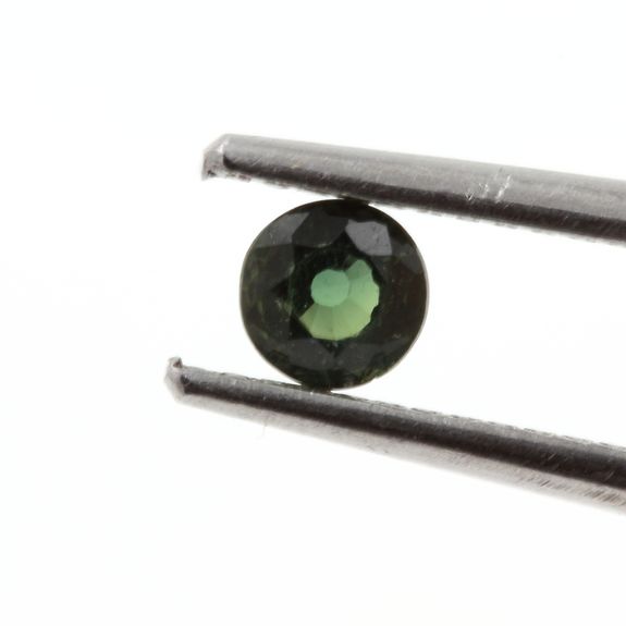 0.21 cts. GREEN SAPPHIRE. UNHEATED