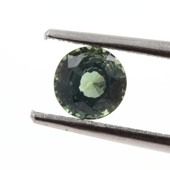 0.59 cts. GREEN SAPPHIRE. UNHEATED