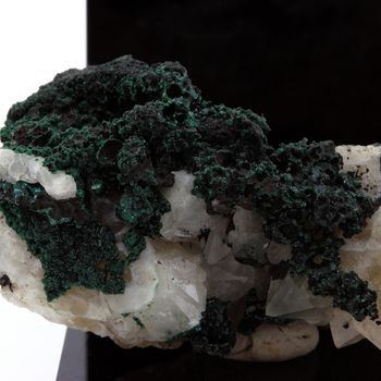 Malachite on Quartz.