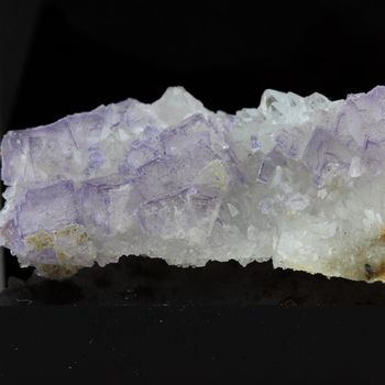 Purple fluorite with quartz.