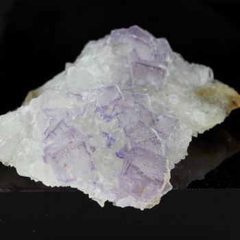 Purple fluorite with quartz.