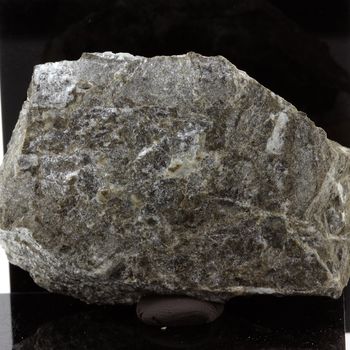 Meneghinite + Ankerite.