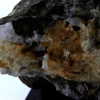 Meneghinite + Ankerite.