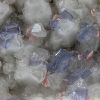 Rhodochrosite + Fluorite.