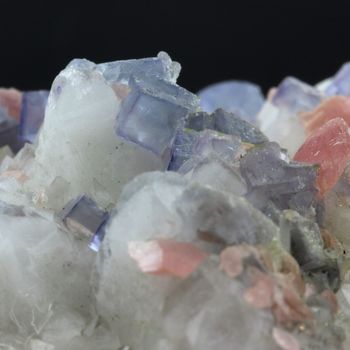 Rhodochrosite + Fluorite.