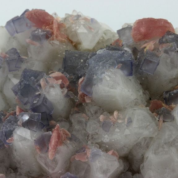 Rhodochrosite + Fluorite.