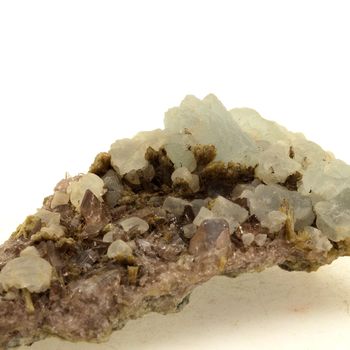 Axinite + Prehnite. 173.9 ct.