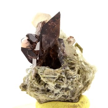 Axinite + Quartz. 98.1 ct.