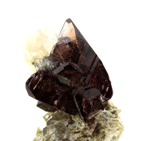 Axinite + Quartz. 98.1 ct.