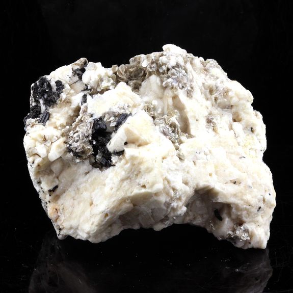 Tourmaline + Orthoclase.