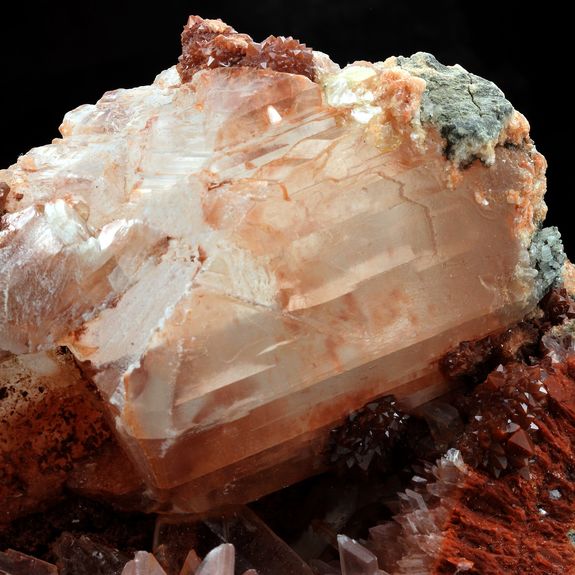 Gypsum + Hematoide Quartz.