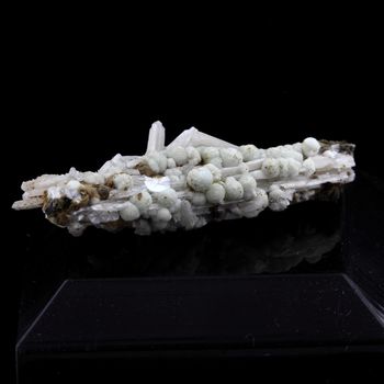 Dundasite, Cerusite on Limonite.