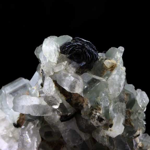 Albite + Epidote + Hematite.