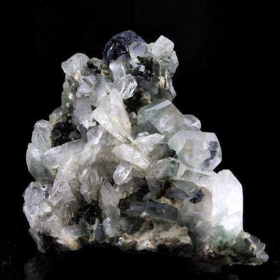 Albite + Epidote + Hematite.