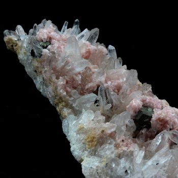 Rhodochrosite, Quartz, Pyrite.