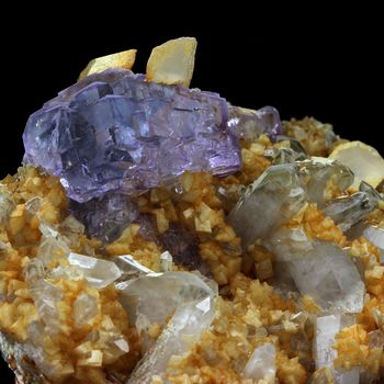 Fluorite + Calcite + Quartz.