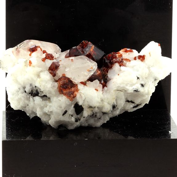 Spessartine Garnet, Orthoclase, Quartz, Tourmaline.