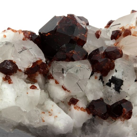Spessartine Garnet, Orthoclase, Quartz, Tourmaline.